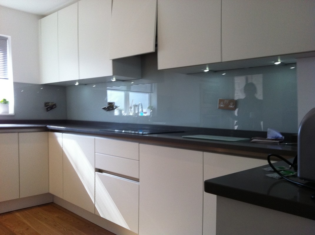 Grey glass kitchen splashback with LED lighting in Mayfair