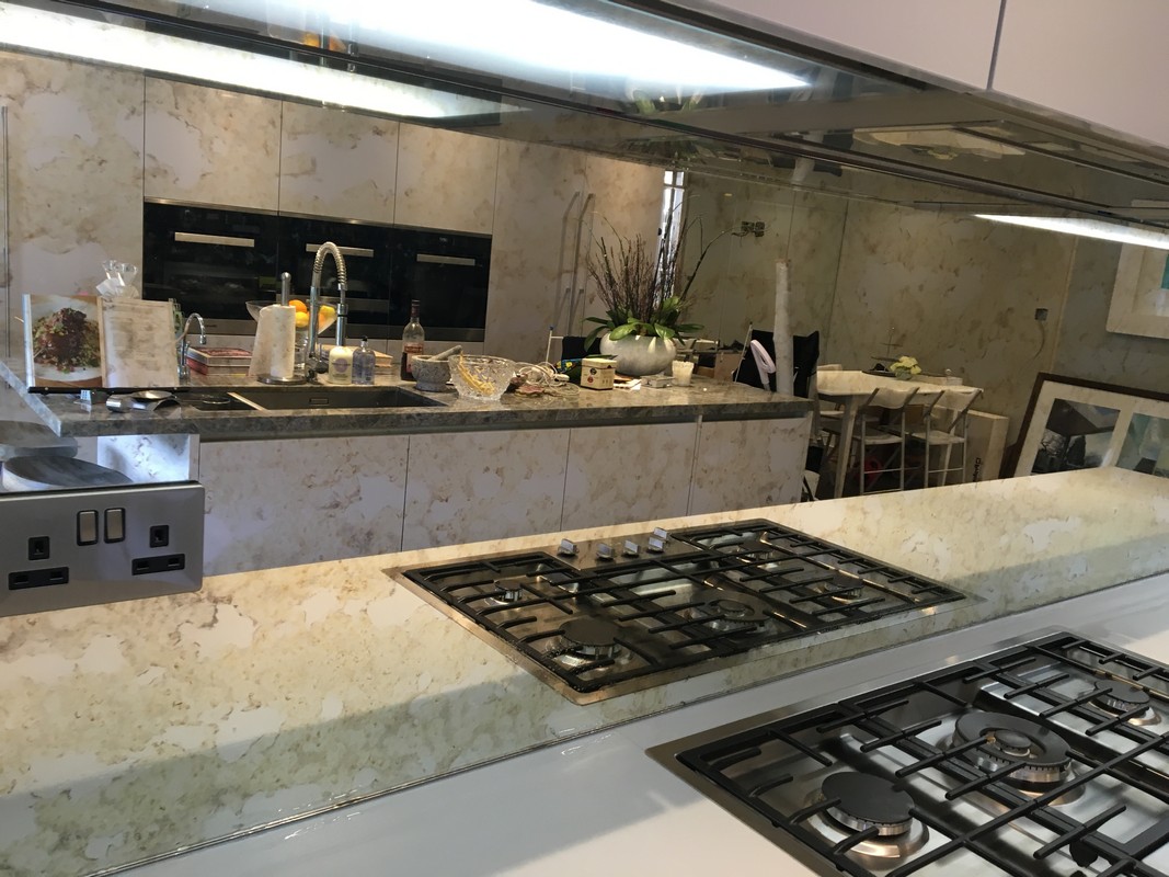 Mirror glass splashback in Mayfair luxury kitchen