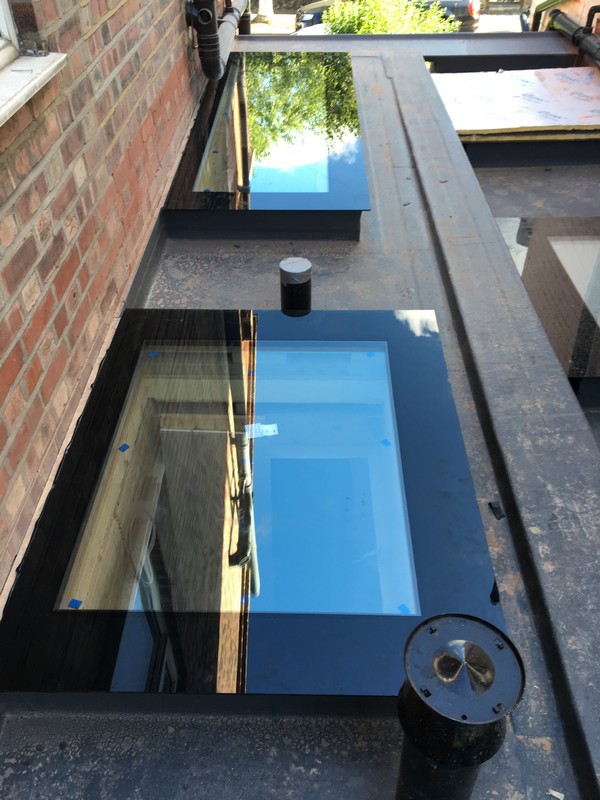 Multiple flat roof skylights on extension in Mayfair